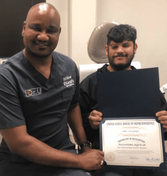Alex displays his award with Dr.U at the Dr.U Hair and Skin Clinics in Los Angeles Alex displays his award with Dr.U at the Dr.U Hair and Skin Clinics in Los Angeles